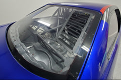 Rear window vents installed in the polycarbonate window of our blue BMW E36