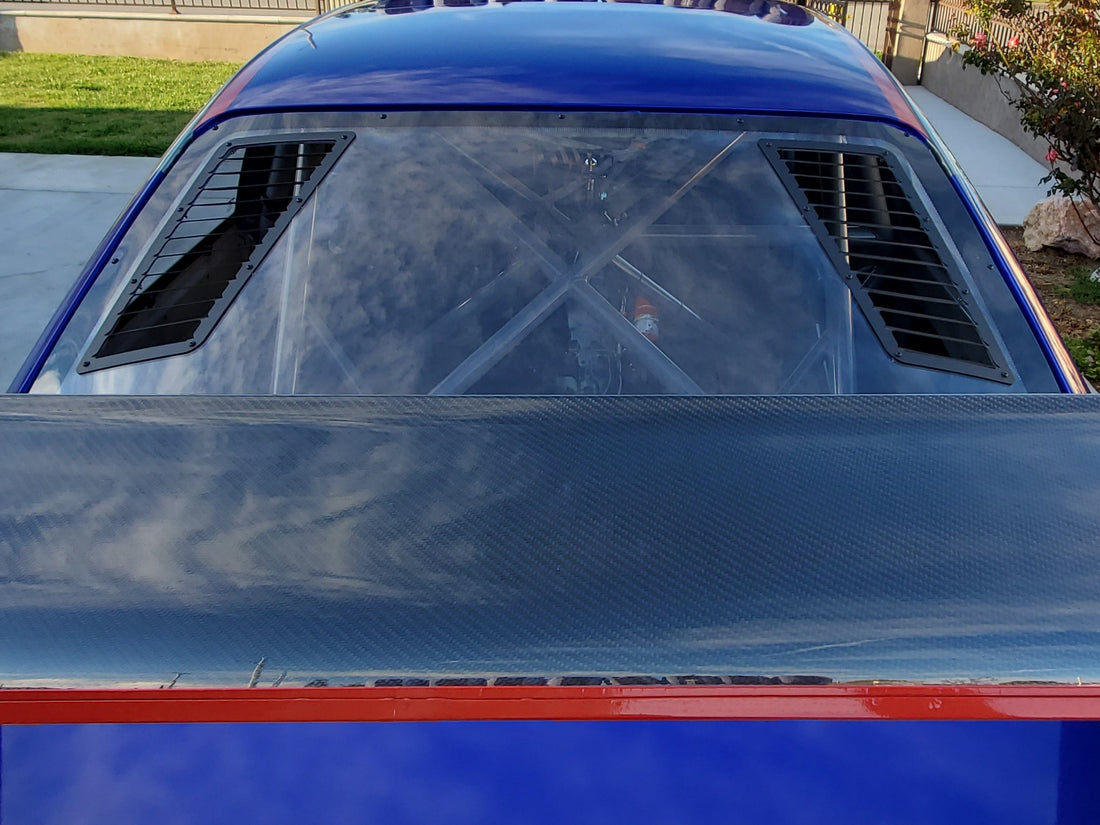 Rear window vents on our blue BMW E36 race car, rear view