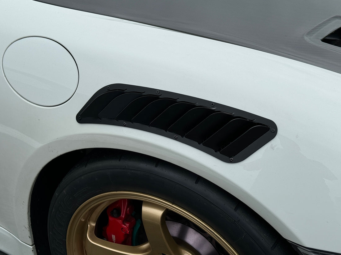 Upper fender vent on a Porsche 981 Cayman front fender
