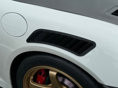 Upper fender vent on a Porsche 981 Cayman front fender