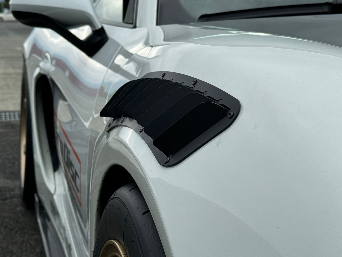 Porsche Cayman upper fender vent, close-up