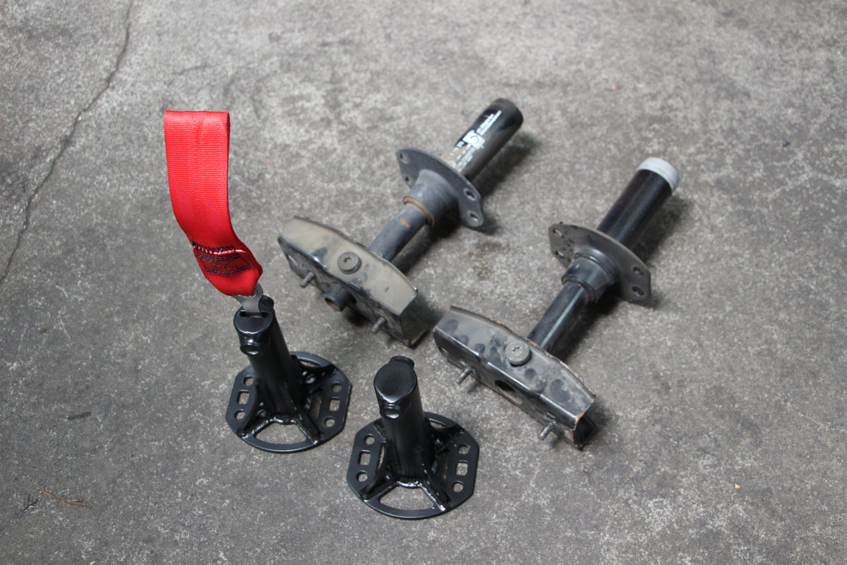BMW E36 bumper supports and red tow straps, full kit laid out