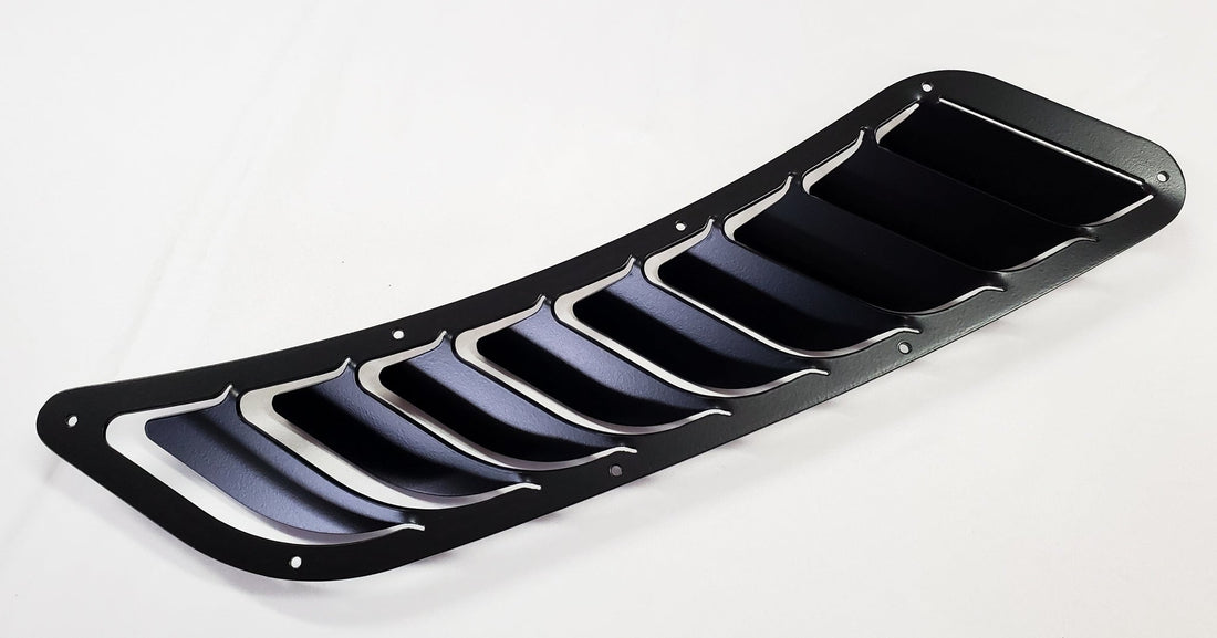 Fender vent louver with rivet holes, angled view