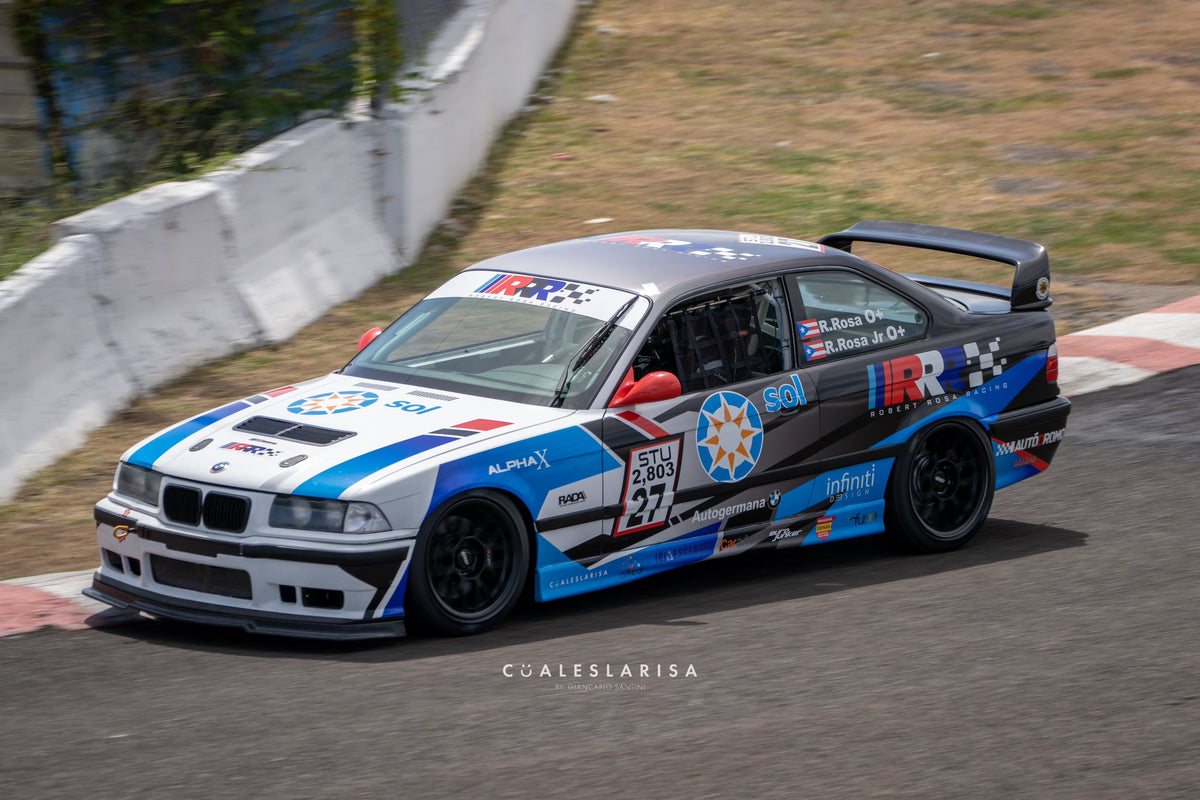 BMW E36 race car with louvered hood vents on track
